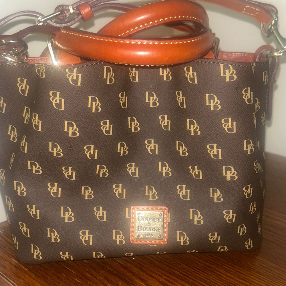 Dooney & Bourke Brown and Tan Gretta Monogram Shoulder Bag.